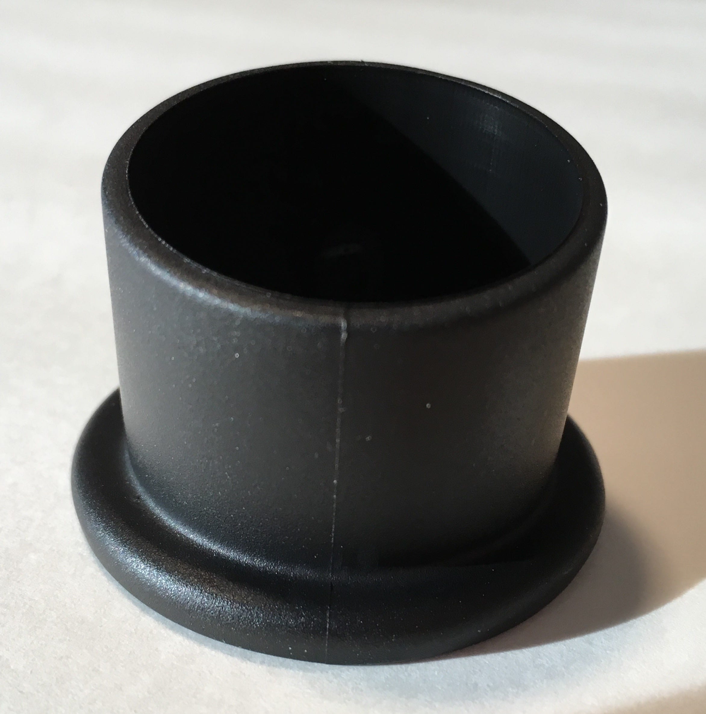 Fusskappe schwarz ø=32mm schräg mit Tellerfuss für MWH (10 10 00 02