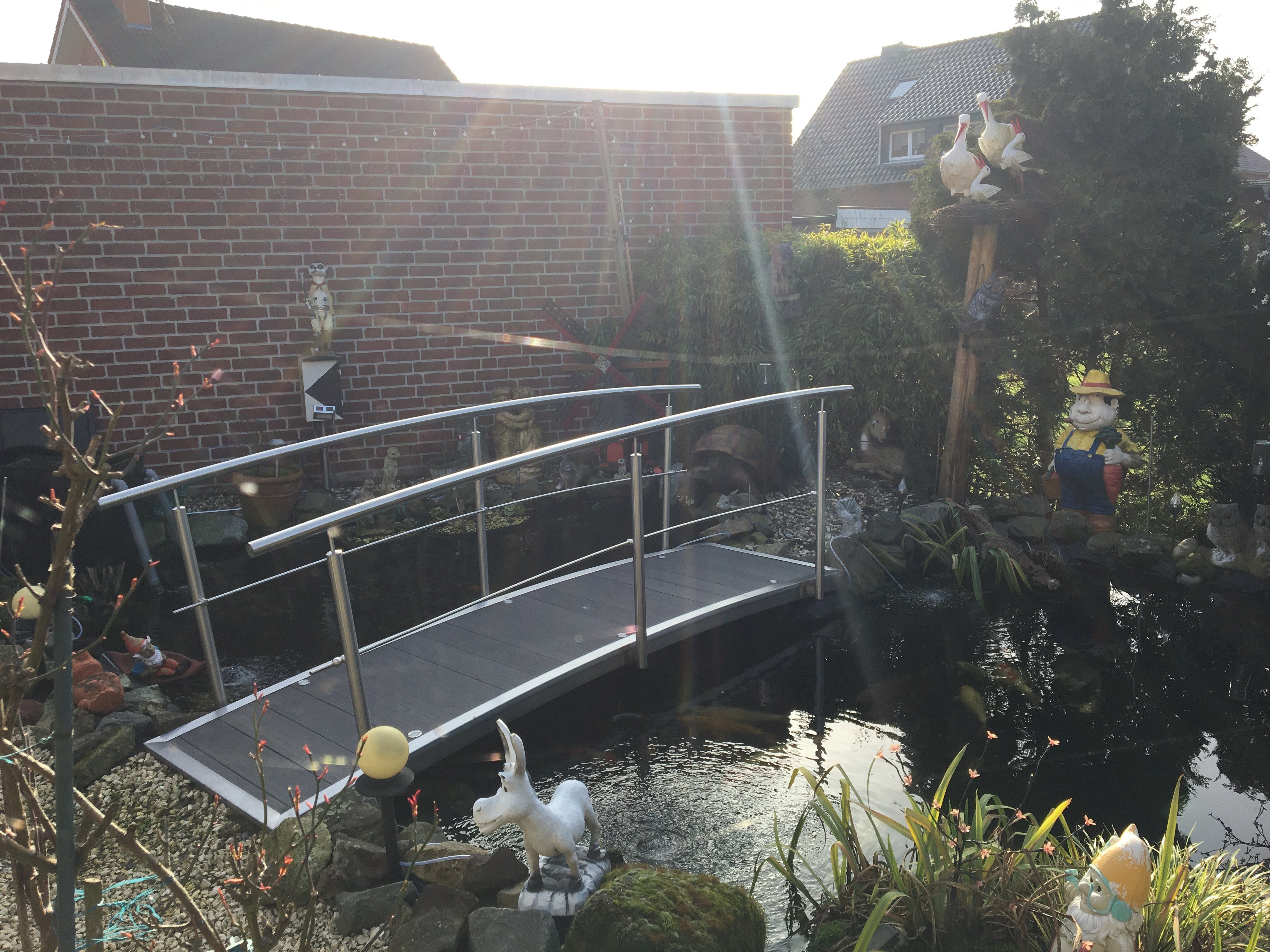 Teichbrücke aus Edelstahl beidseitiger Handlauf WPC Anthrazit Shop